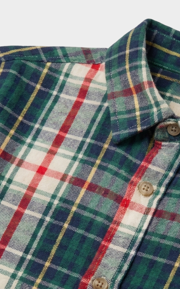 Closeup of tartan check pattern and buttons on Boys Green Red Checks Shirt, boys cotton shirts