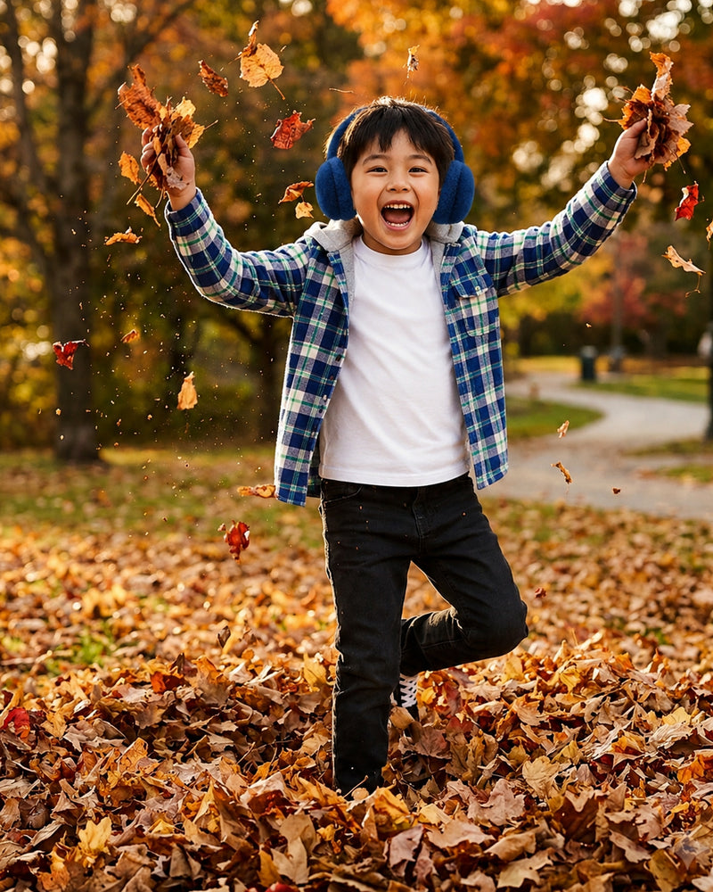 Boy throwing autumn leaves in Green Blue Shacket with Hood, playful fall outfits for boys