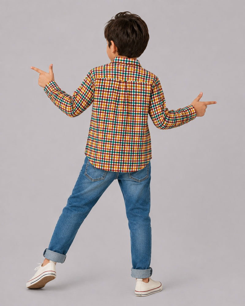 Boy in Multicolor Check Shirt pointing playfully, back view, Kissa boys clothing collection