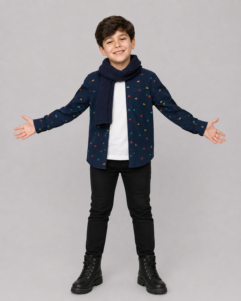 Smiling boy in scarf wearing Navy Christmas Shirt, a festive pick from Kissa's boys shirts