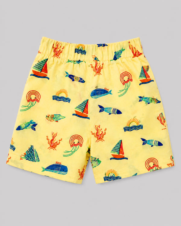 Boys yellow ocean themed shorts, back view showing elastic waist and fish print