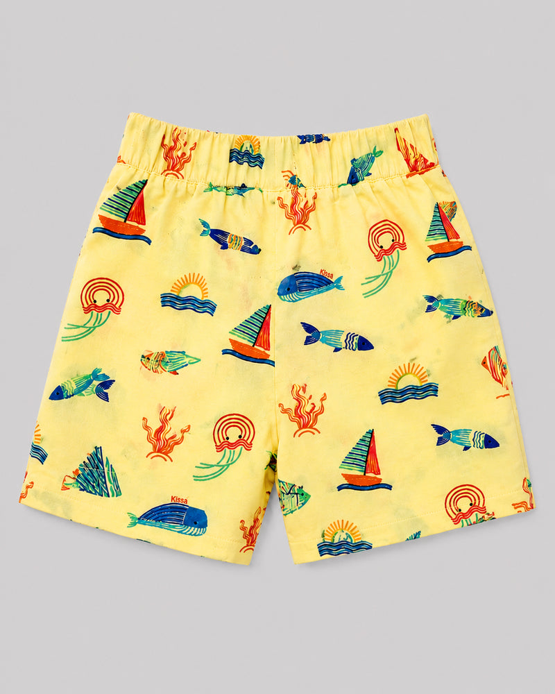 Boys yellow ocean themed shorts, back view showing elastic waist and fish print