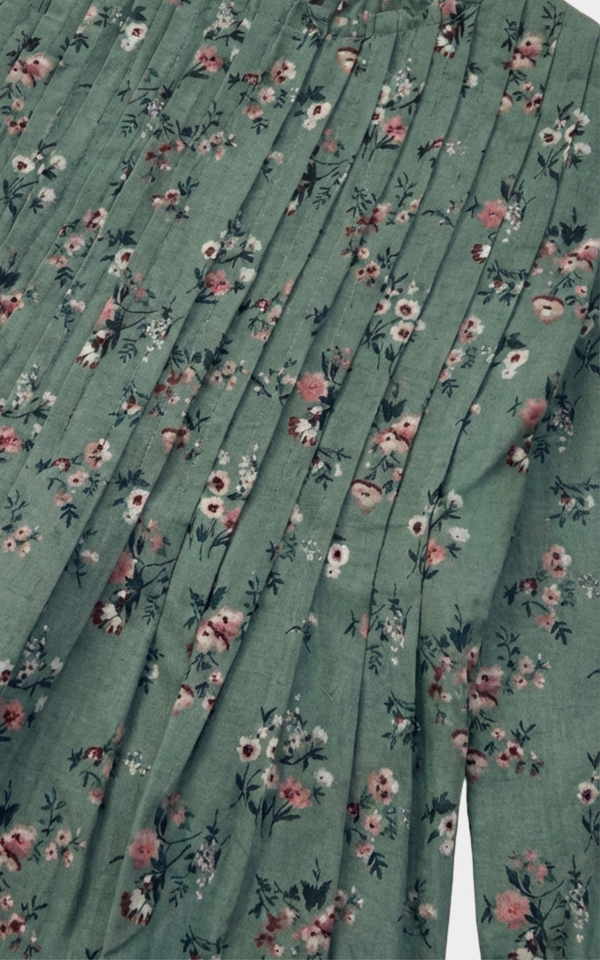 Closeup of pintuck pleats and floral print on Girls Green Dress, cute toddler girl dresses