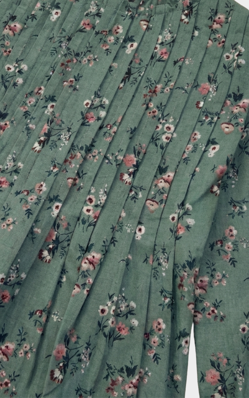 Closeup of pintuck pleats and floral print on Girls Green Dress, cute toddler girl dresses