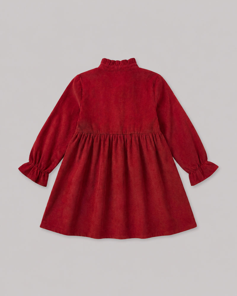 Back view of deep red corduroy dress with ruffle collar and full skirt, classic girl clothes