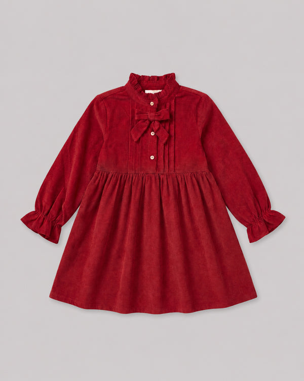 Flat lay of red corduroy dress with pintuck bodice and bow tie, a charming smock dress