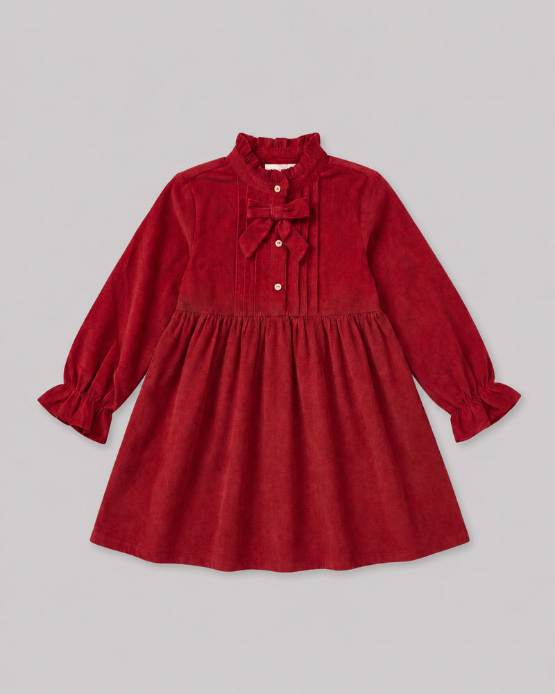 Flat lay of red corduroy dress with pintuck bodice and bow tie, a charming smock dress