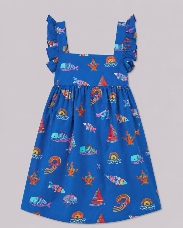 Ocean themed dress for girls, blue with fish, coral, and sailboat print, ruffle straps