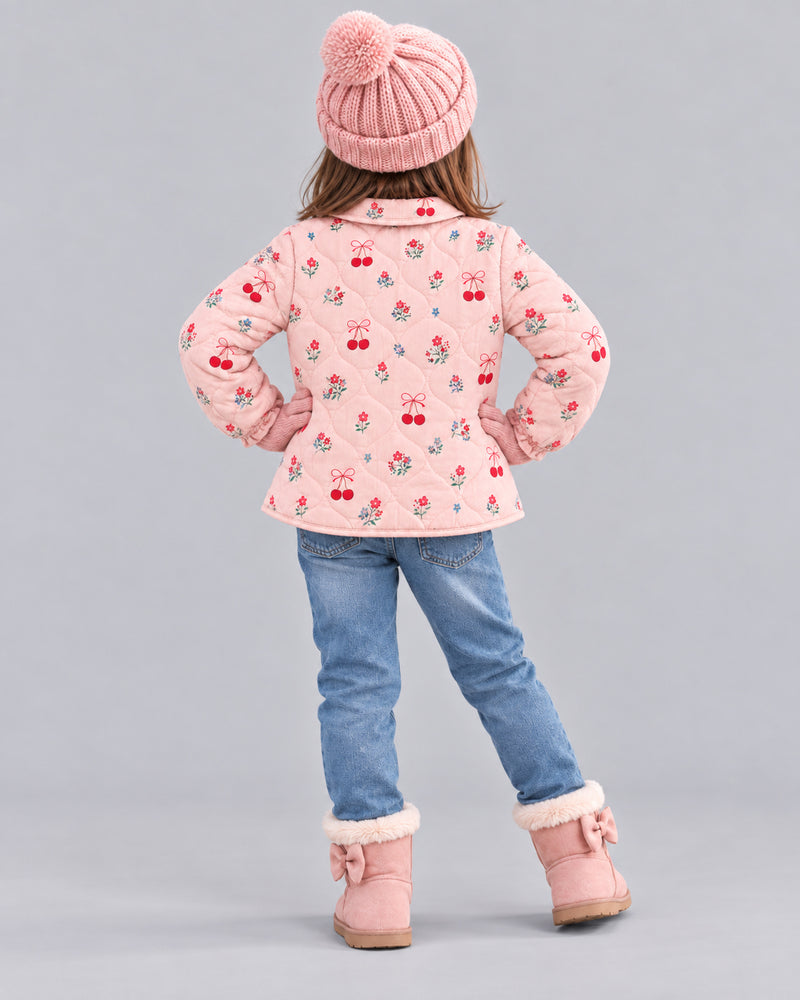 Girl in pink pom-pom hat wearing cherry print quilted jacket, cozy girls winter coats from behind