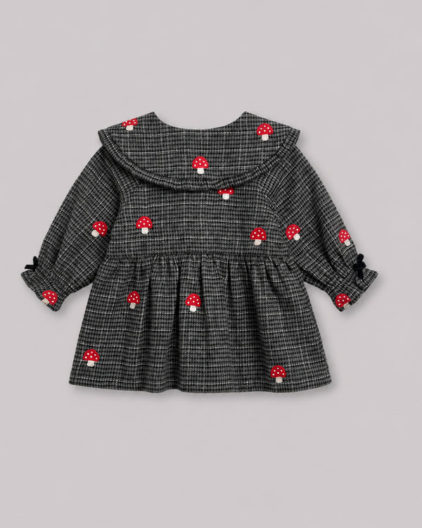 Back view of grey houndstooth mushroom embroidered girls top, a cozy smock dress style topper