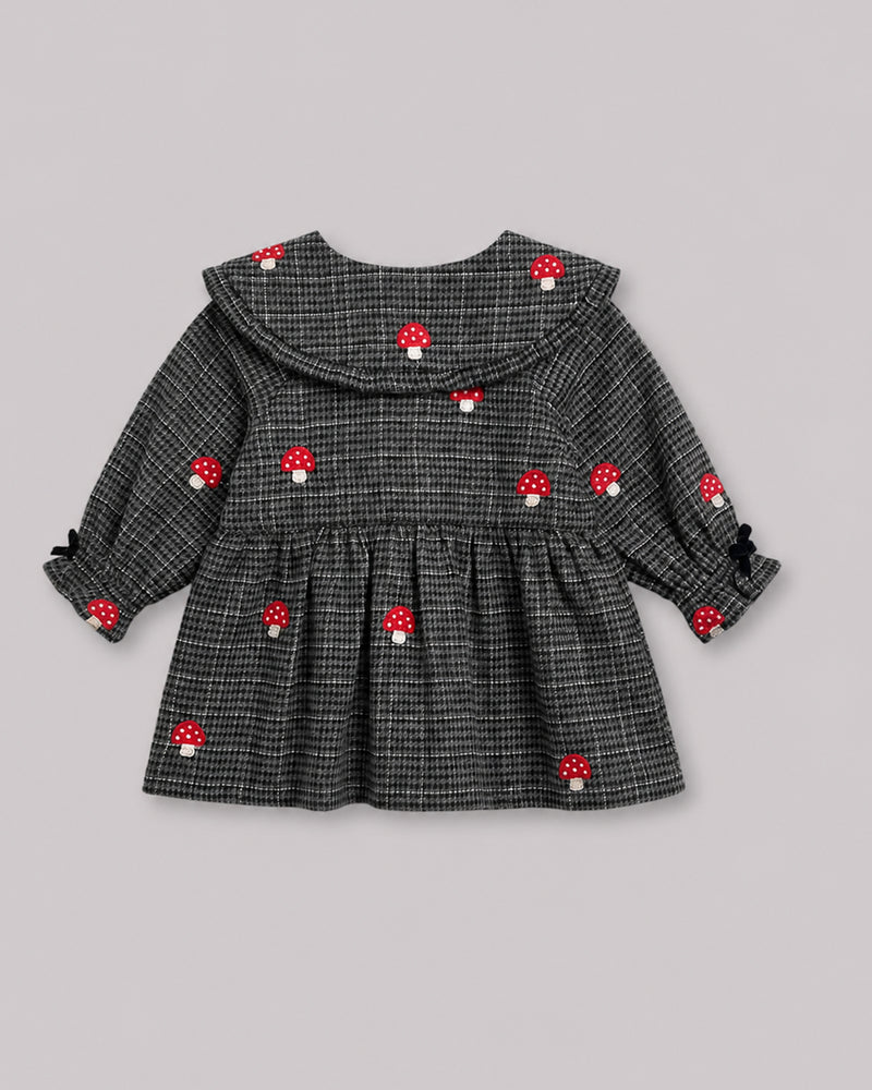 Back view of grey houndstooth mushroom embroidered girls top, a cozy smock dress style topper